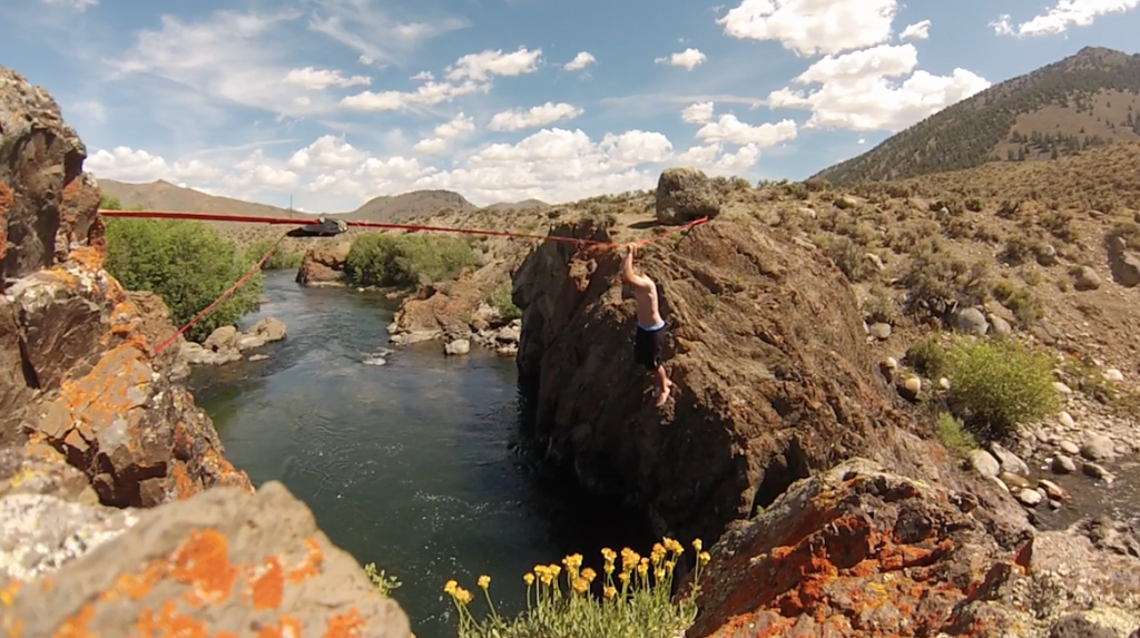 Testing out the slackline over the river at the Trail Creek destination